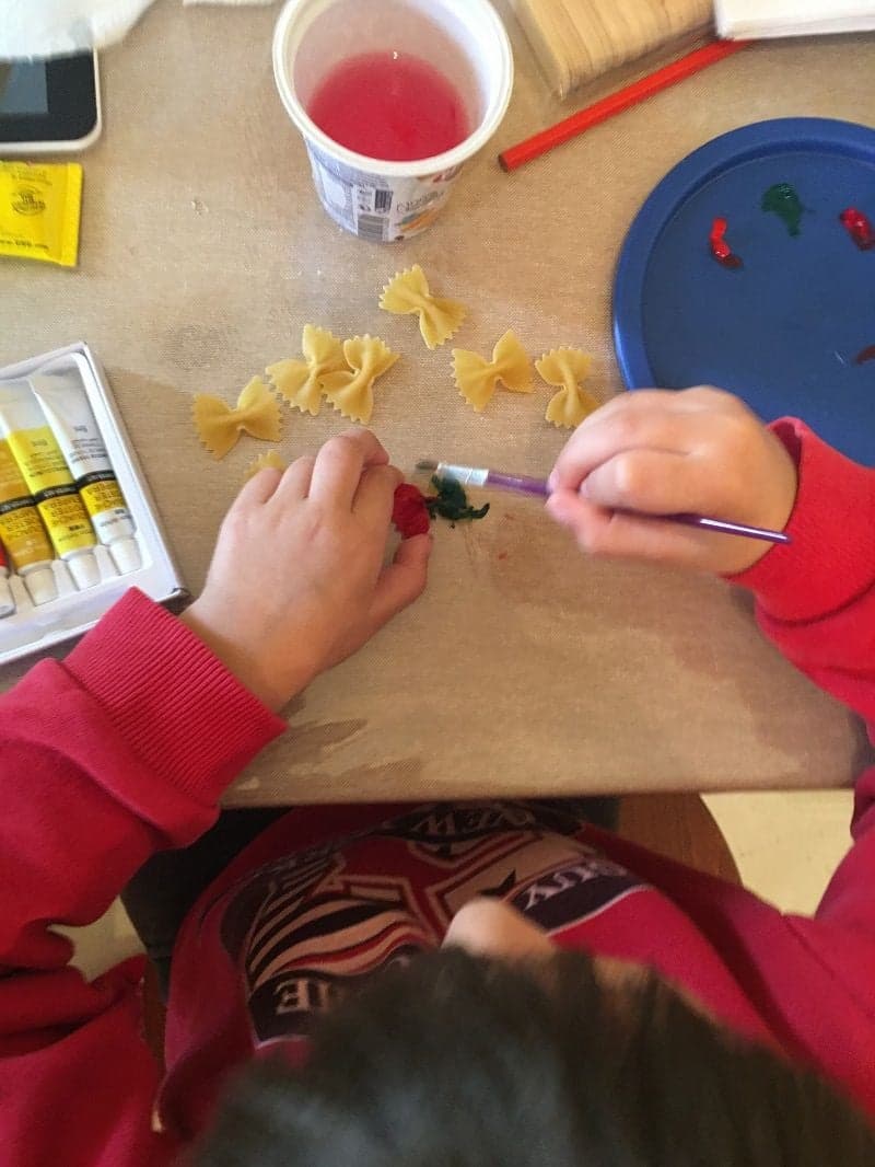 Butterflies craft for preschoolers with spaghetti bows and water colors.