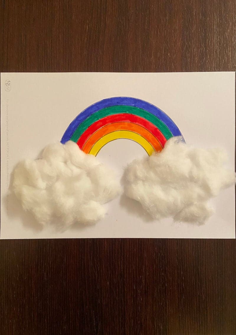 Cotton rainbow craft for preschoolers with free printable rainbow.