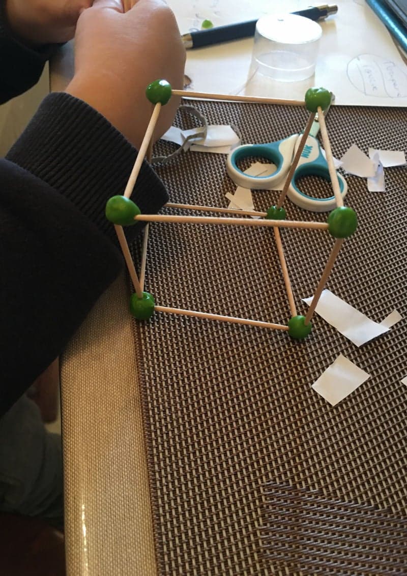 Educational play for preschoolers with peas and toothpicks. Learning shapes.