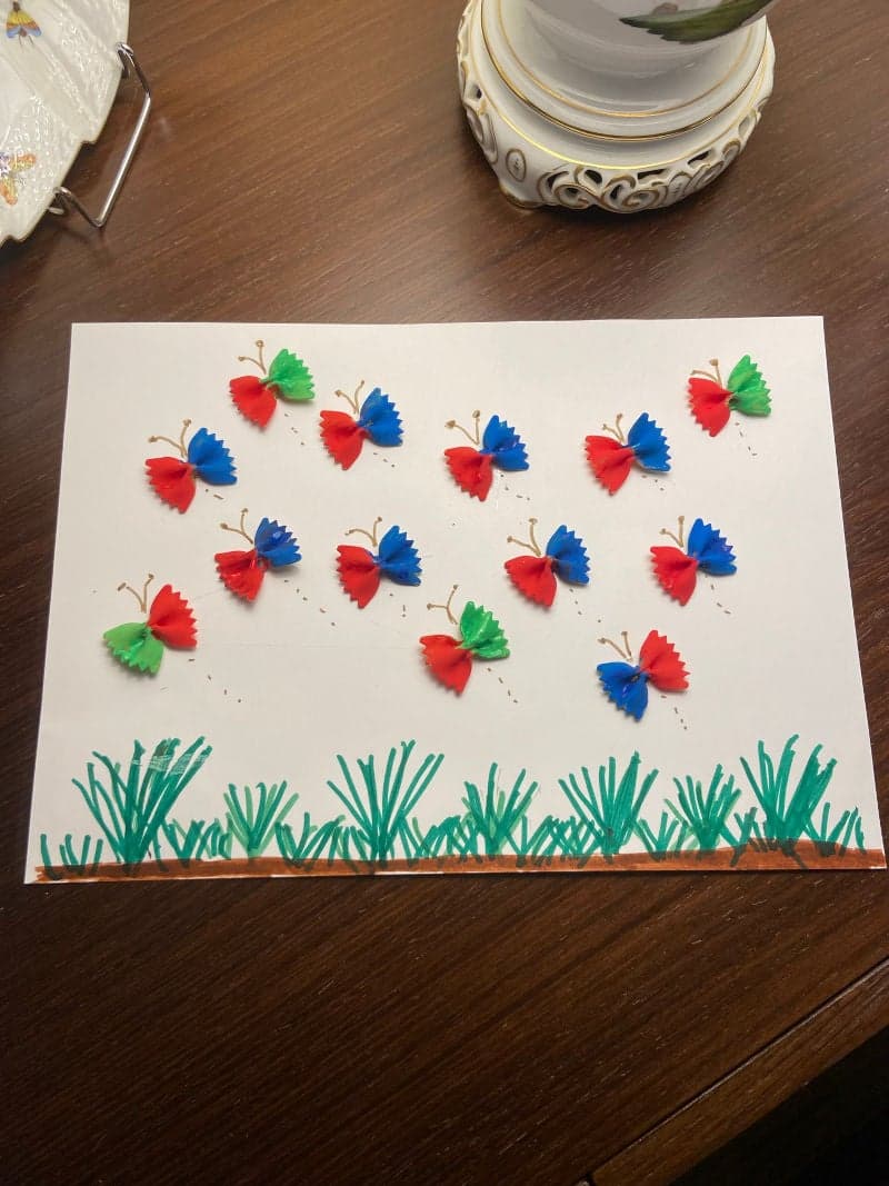 Butterflies craft for preschoolers with spaghetti bows and water colors.